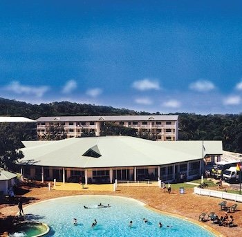 Overview aerial shot of the k'gari beach resort accommodation and swimming pool