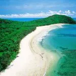 Stunning aerial view of Daintree’s lush coastline, ideal for exclusive small group Cape Tribulation day tours and nature adventures.