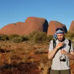 A photographer documents the 3 Day Uluru Rock The Centre Tour from Yulara to Alice Springs in the Australian desert landscape.