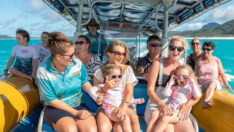 People at ocean rafting boat