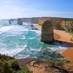 Experience the majestic Twelve Apostles’ towering limestone stacks on a top-rated Great Ocean Road day tour with Go West in Australia.