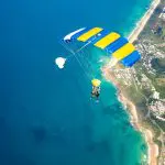 Experience a spectacular tandem skydive with Skydive Noosa, soaring 15,000ft above pristine beaches and crystal-clear waters.