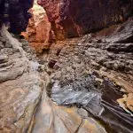 Stunning narrow rocky gorge with dramatic, layered stone walls—a must-see on the 10 Day Perth to Broome West Coast Adventure tour.
