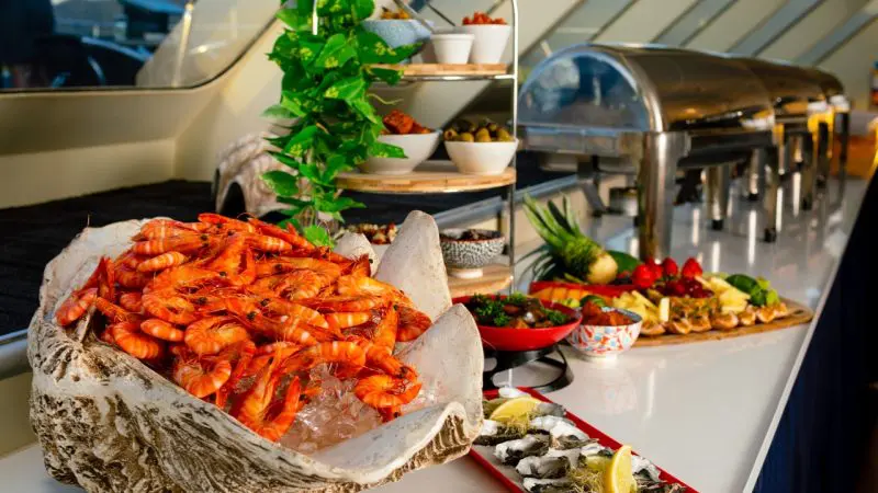 Seafood meal including prawns and oysters