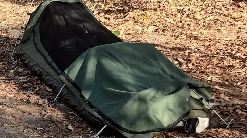 A durable green swag tent is pitched for a 5-Day 4WD Kakadu, Katherine Gorge, and Litchfield adventure tour departing from Darwin.