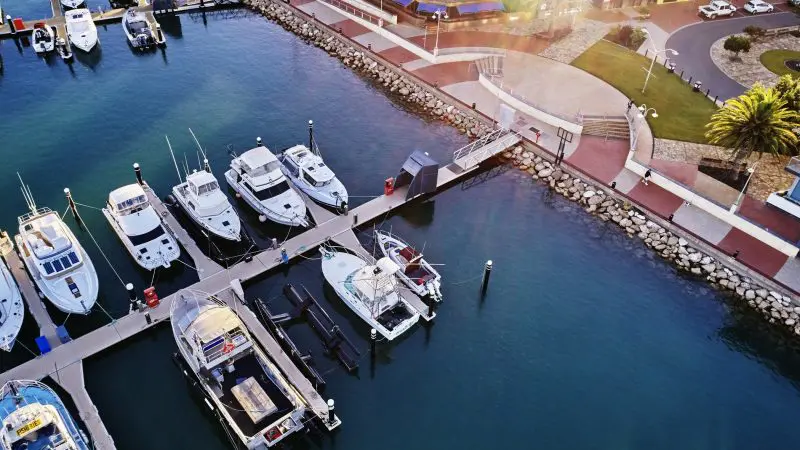 Stunning aerial view of marina with moored boats, featuring prominently in the top-rated 8 Day Perth to Exmouth Comfort Tour.