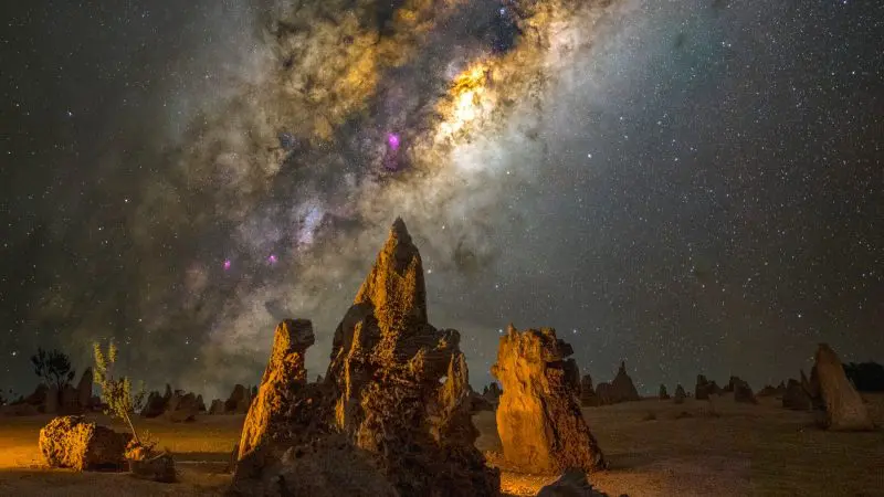 Dramatic Pinnacles rock spires illuminated by a dazzling star-filled night sky during Autopia’s top-rated 1 Day Sunset Stargazing Tour.