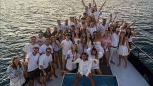 A group of solo travellers making friends on the Atlantic Clipper sailing boat
