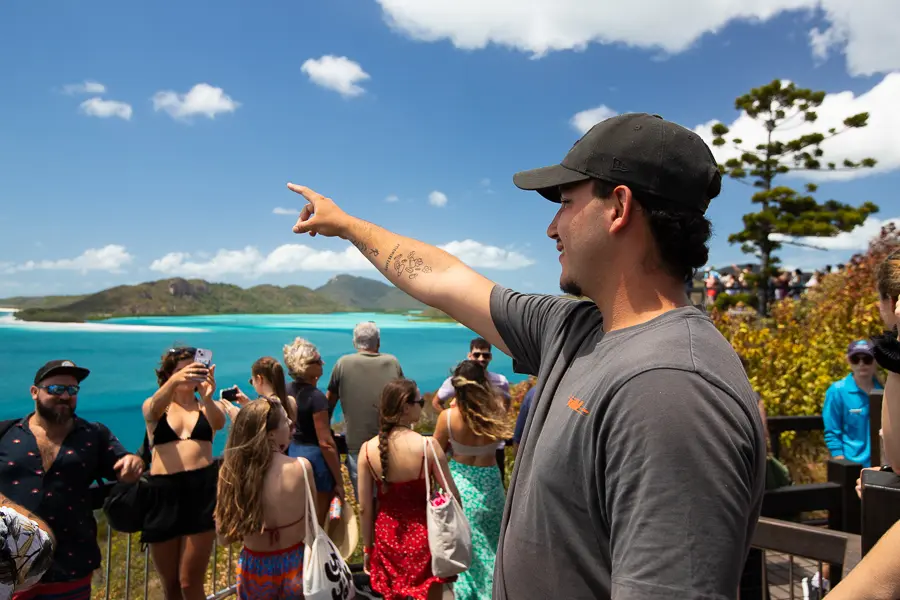 tour guide leading a group in the whitsundays