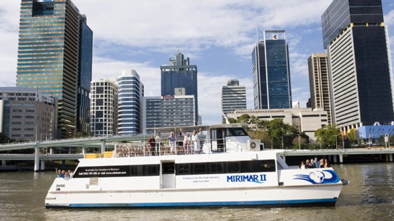 Scenic white river cruise boat with passengers provides return journey to Lone Pine Koala Sanctuary, entry ticket included.