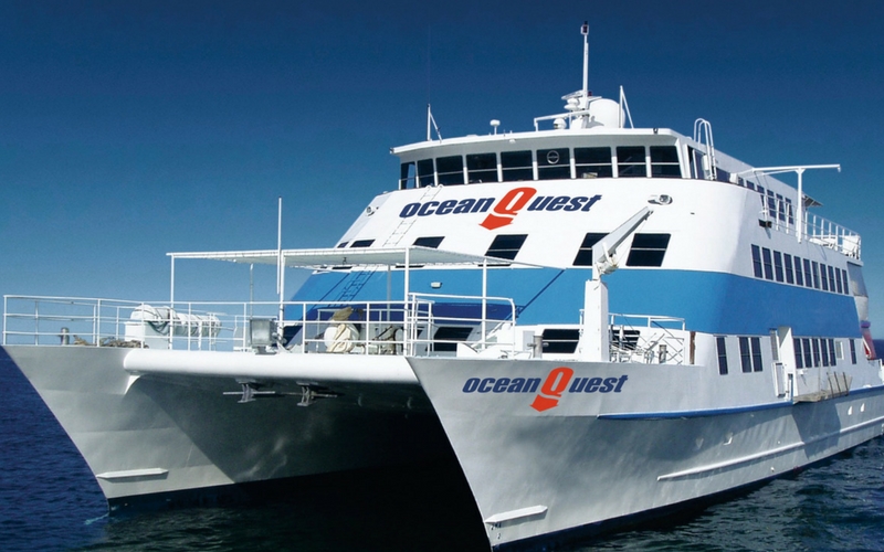 Ocean Quest, a spacious white and blue catamaran, is ready for your 2 Day 1 Night PADI Advanced Dive Course adventure.
