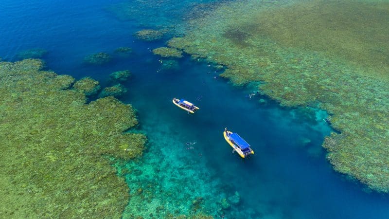 boats sailing through whitsundays