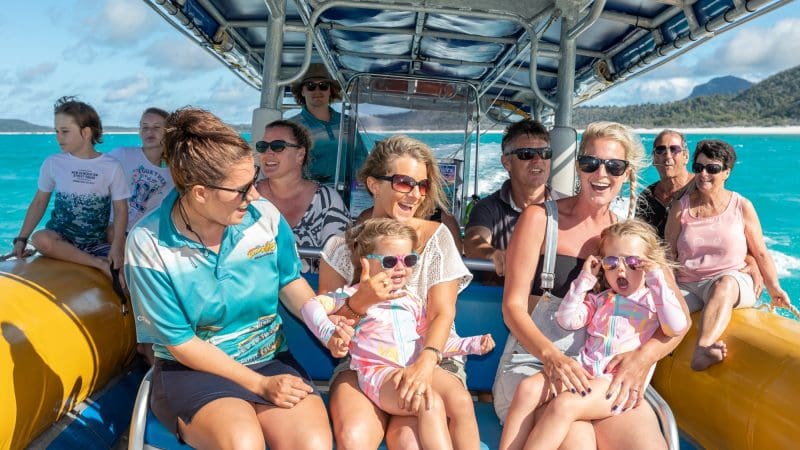 People at ocean rafting boat