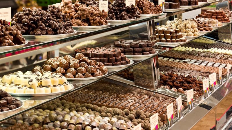 Showcase of premium assorted chocolates, a tempting highlight on your Lake Mountain Snow Waterfalls Tour from Melbourne.