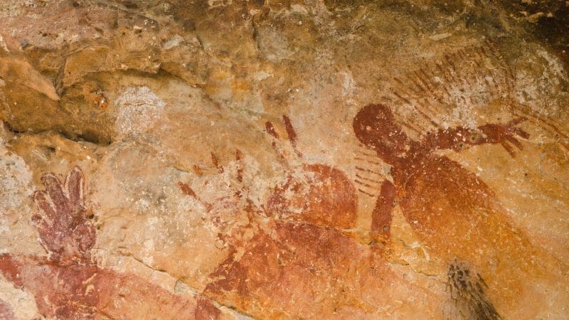 Discover vibrant red and brown ancient rock art on cave walls during the 10 Day Broome to Darwin 4WD Kimberley Adventure tour.