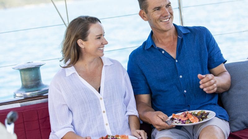 couple eating at Lady enid sailing boat