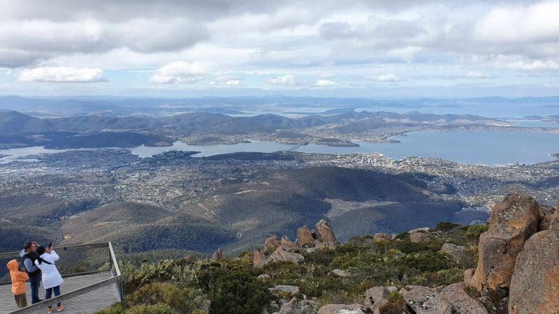 Travellers enjoy panoramic views of Gordon Dam, Lake Pedder, and scenic wilderness on a small group guided day tour in Tasmania.