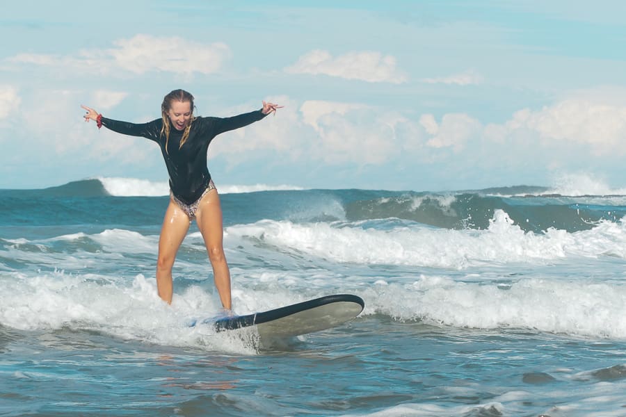 girl surfing in byron bay australia