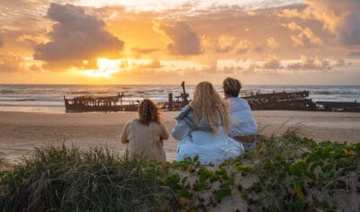 guests watching sunrise on kgari fraser island