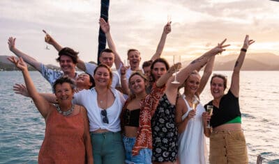 tour group smiling on a whitsundays sailing tour east coast australia